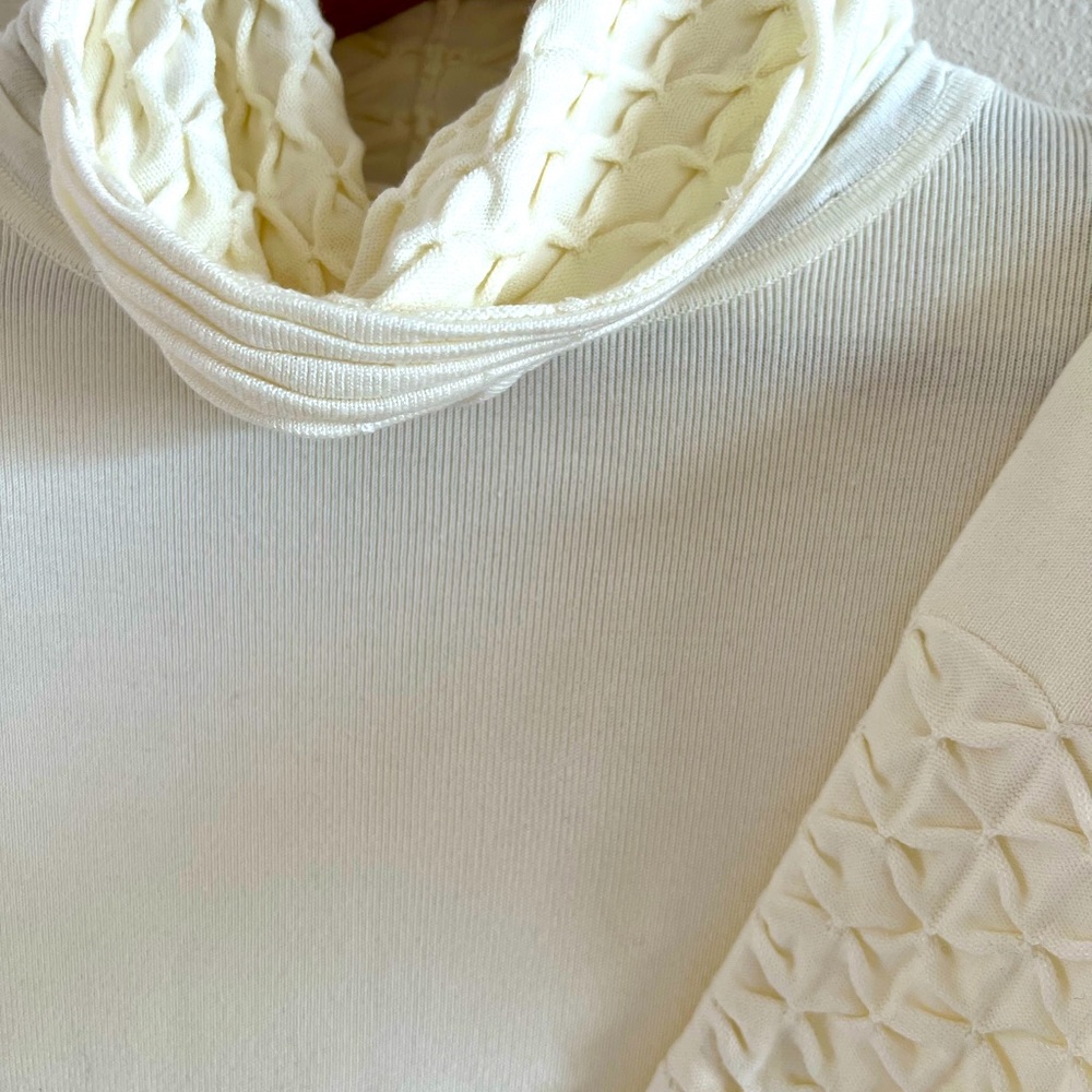 Never worn Ivory colored cowl necked sweater dress.